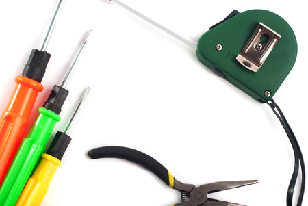 set of repair tools, screwdrivers, pliers, tape measure, isolated on white background, template designer, construction toolsの写真素材