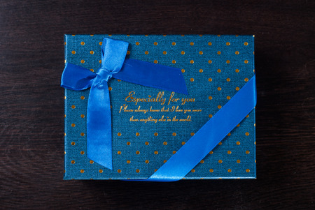 Gift box blue with blue ribbon, gift on 8th March, women's day,の写真素材