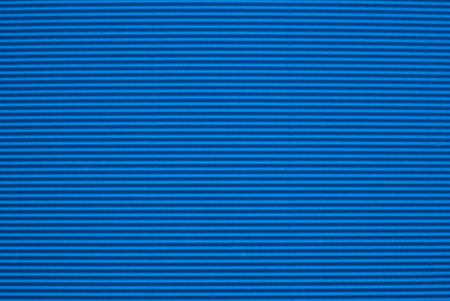Blue material background texture, corrugated surface, color carton for applicationsの写真素材