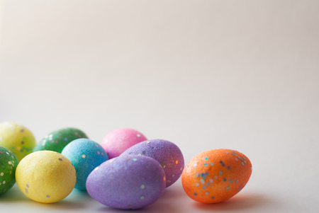 Easter eggs on white background, decorative eggs, happy Easter, template for background, festive backgroundの写真素材