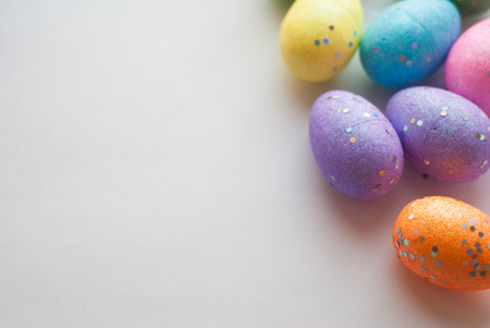 Easter eggs on white background, decorative eggs, happy Easter, template for background, festive backgroundの写真素材