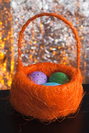 Decorative Easter eggs in a basket, Traditional decoration, happy Easter, layout for postcardの写真素材
