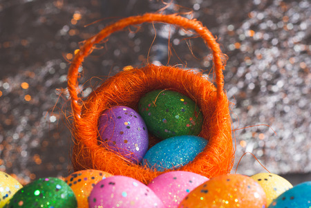 Decorative Easter eggs in a basket, Traditional decoration, happy Easter, layout for postcardの写真素材