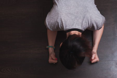 A young girl is pushed from the floor, the concept of fitness, sports clothing,の写真素材