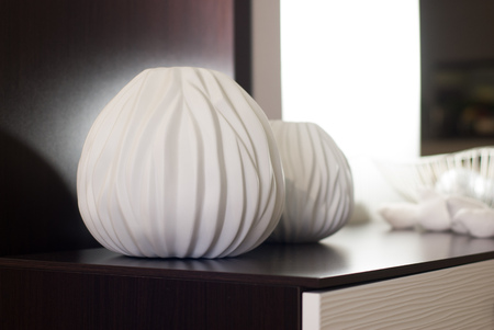 Decorative vase made of clay is on the dresser, home decor, concept decorの写真素材