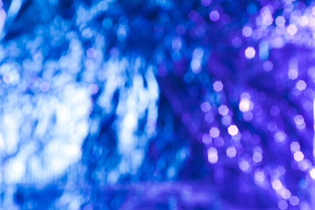Bokeh abstract background, blue and white highlights in the whole frameの写真素材