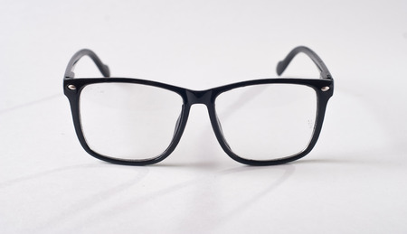 Black glasses on a white background, hipster style, plastic frames, the concept of poor visionの写真素材