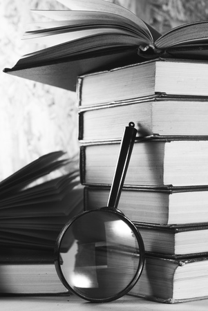 Magnifying glass and books,の写真素材