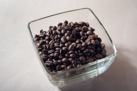 Coffee beans in a glass bowl, pattern for coffee commercialの写真素材