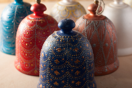 Decorative bell handmade ceramics, colorful Souvenirs from clay and hand painted,の写真素材