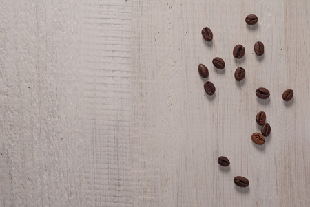 coffee beans on wooden table, top view, minimalismの写真素材