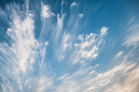 Dramatic sky at sunset, the contrast of Cirrus cloud shapes, cloud abstract landscapeの写真素材