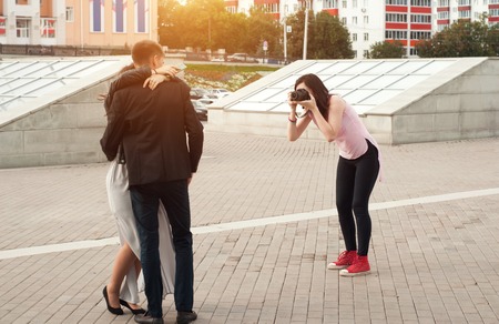 Girl photographer, photography lovers, photo shoot in the cityの写真素材