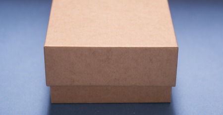 Christmas gift box with blue background. Festive backgroundの写真素材