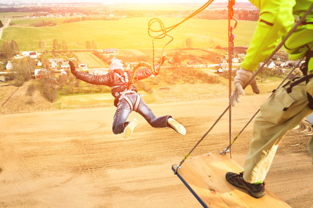 Rope-jumping, or bungee jumping, free falling, extreme holidays, extreme peopleの写真素材