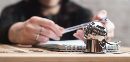 vintage microphone closeup, the girl works as a radio DJ,の写真素材