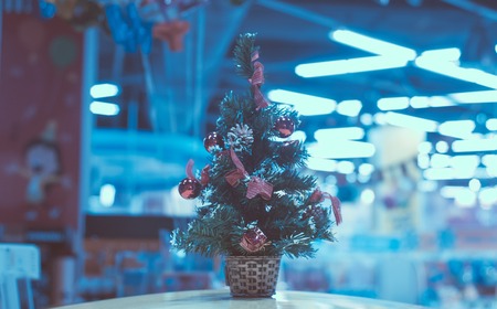 Christmas tree and neon lights, fluorescent lamps in blur, bokehの写真素材
