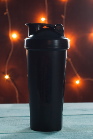 Shaker Christmas background. The concept of Sports nutrition at the Christmas tableの写真素材