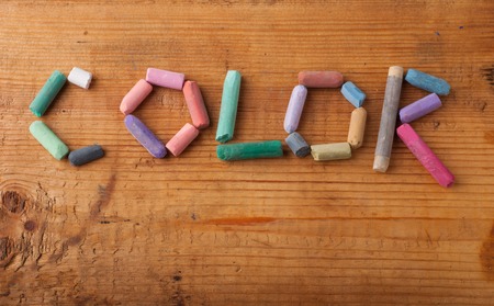 Color. The inscription of crayons, wooden tableの写真素材
