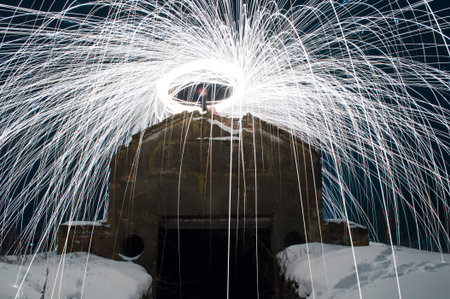 white sparks. Winter creative landscape. Hidden in the woods the entrance to a secret military...