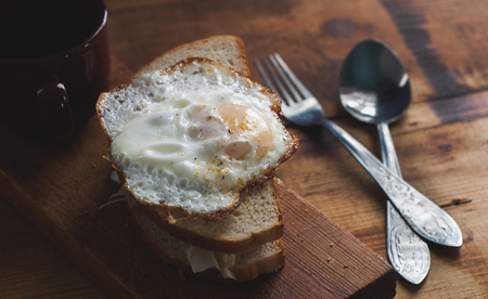 Home made sandwich, homemade food, a sandwich with fried egg and cabbageの写真素材