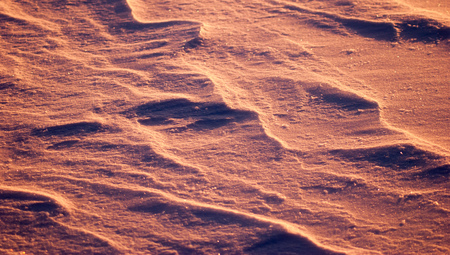 Abstract winter background, beautiful and unusual snow texture, snow driftsの写真素材