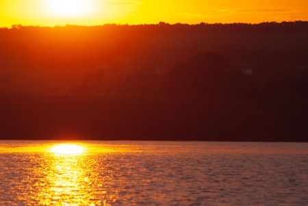 early morning sunrise on a troubled river, idealistic landscape,の写真素材