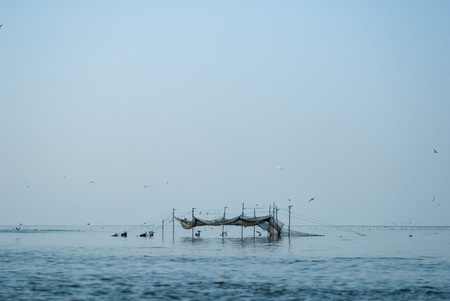 Fishing nets in the form of a spiral, a trap for fish, the concept of poachers,の写真素材