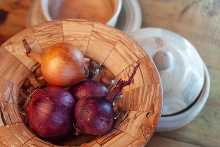wooden utensils, raw onions in wooden utensils, close-up,の写真素材