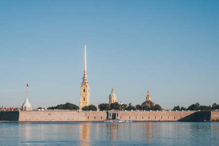 Early morning sunrise with reflection on the water of the Neva river in St. Petersburgの写真素材