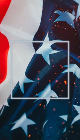 American flag with sparks and frame. Template for holiday cards and banners. USA flag verticalの写真素材
