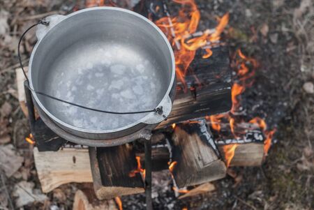 Outdoor cauldron, cooking on a campfire, outdoor recreation concept,の写真素材