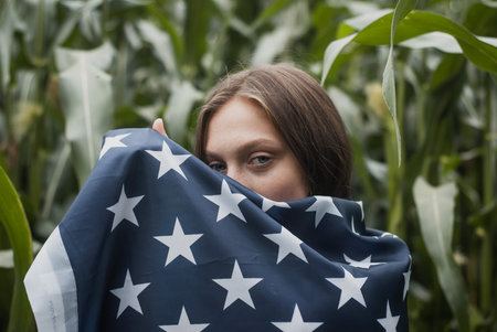 large portrait of a cute girl with an American flag,