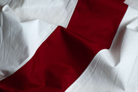 red red and white flag of free Belarus, a symbol of the protests, the Belarusian flag closeupの写真素材