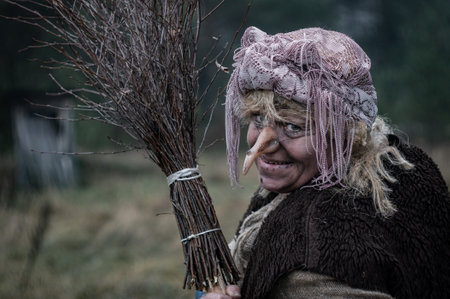 baba yaga portrait, a witch with a broom,の写真素材