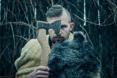 portrait of a viking with an axe