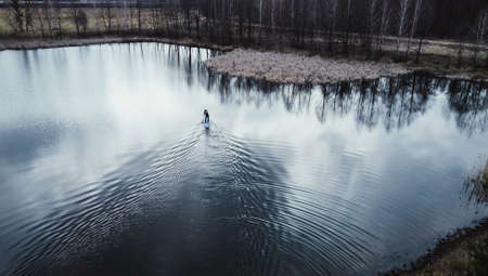 a board with a paddle in winter, top viewの写真素材
