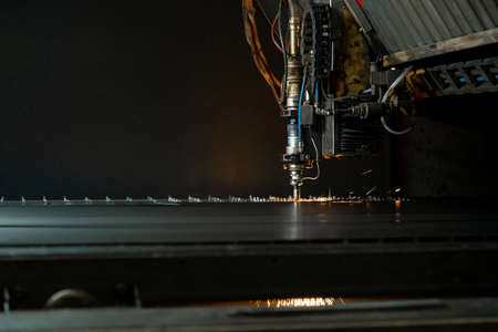 metal cutting machines close-up photos in the process of workの写真素材