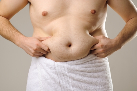 overweight man with big bellyの写真素材
