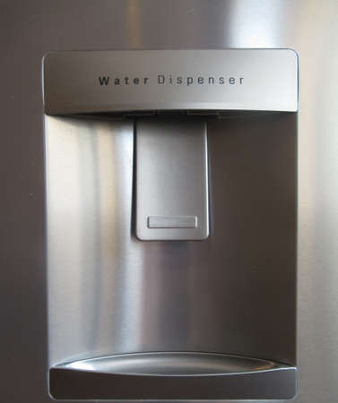 Water dispenser in modern steel fridgeの写真素材