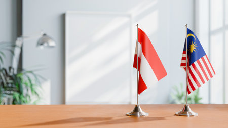 FLAGS OF  AUSTRIA AND MALAYSIA  ON TABLEの写真素材