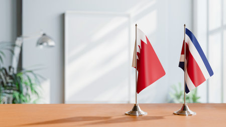 FLAGS OF  BAHRAIN AND COSTA RICA  ON TABLEの写真素材