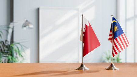 FLAGS OF  BAHRAIN AND MALAYSIA  ON TABLEの写真素材