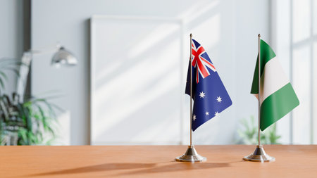 FLAGS OF  AUSTRALIA AND NIGERIA  ON TABLEの写真素材