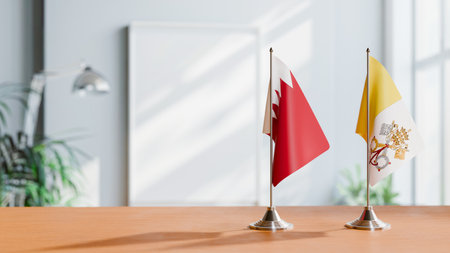 FLAGS OF  BAHRAIN AND VATICAN  ON TABLEの写真素材