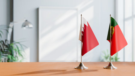 FLAGS OF  BAHRAIN AND PORTUGAL  ON TABLEの写真素材