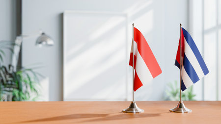 FLAGS OF  AUSTRIA AND CUBA  ON TABLEの写真素材