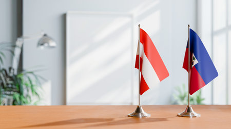 FLAGS OF  AUSTRIA AND HAITI  ON TABLEの写真素材