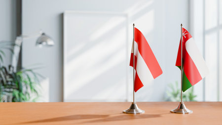 FLAGS OF  AUSTRIA AND OMAN  ON TABLEの写真素材