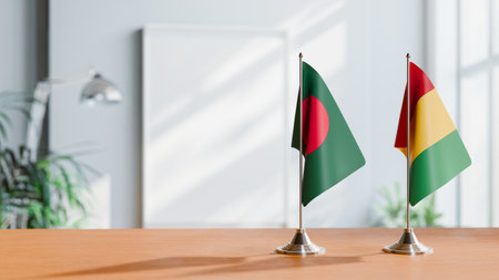 FLAGS OF  BANGLADESH AND GUINEA  ON TABLEの写真素材